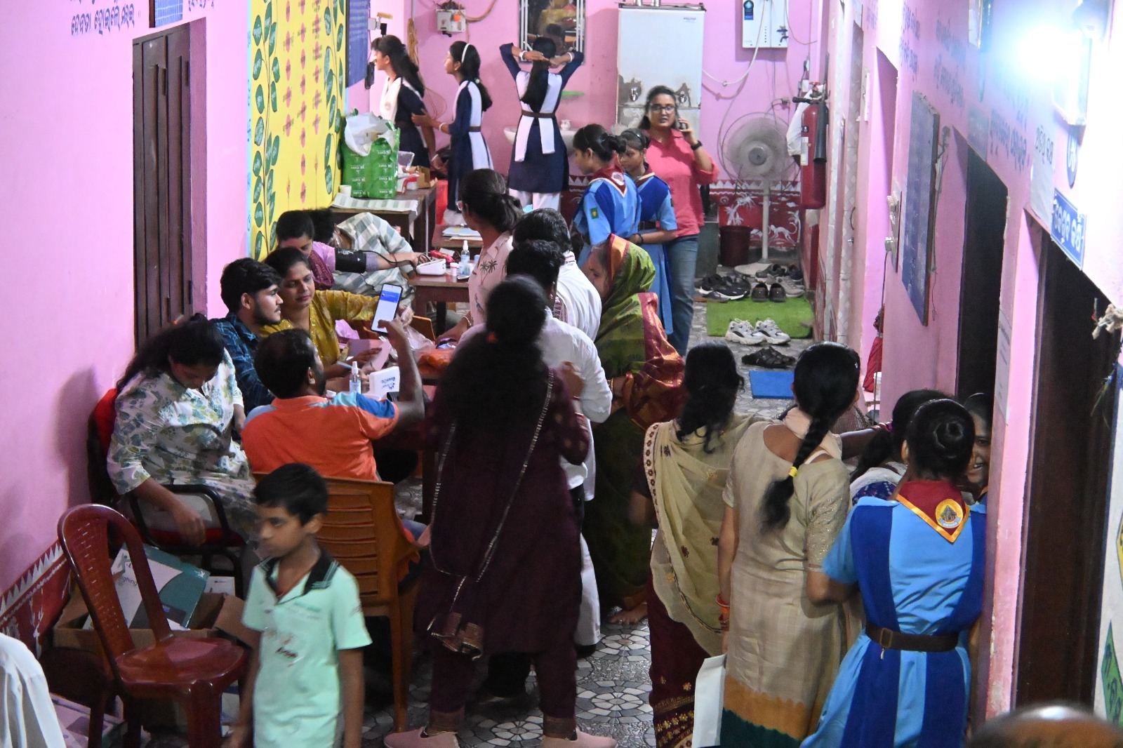 A busy corridor of patients and families
