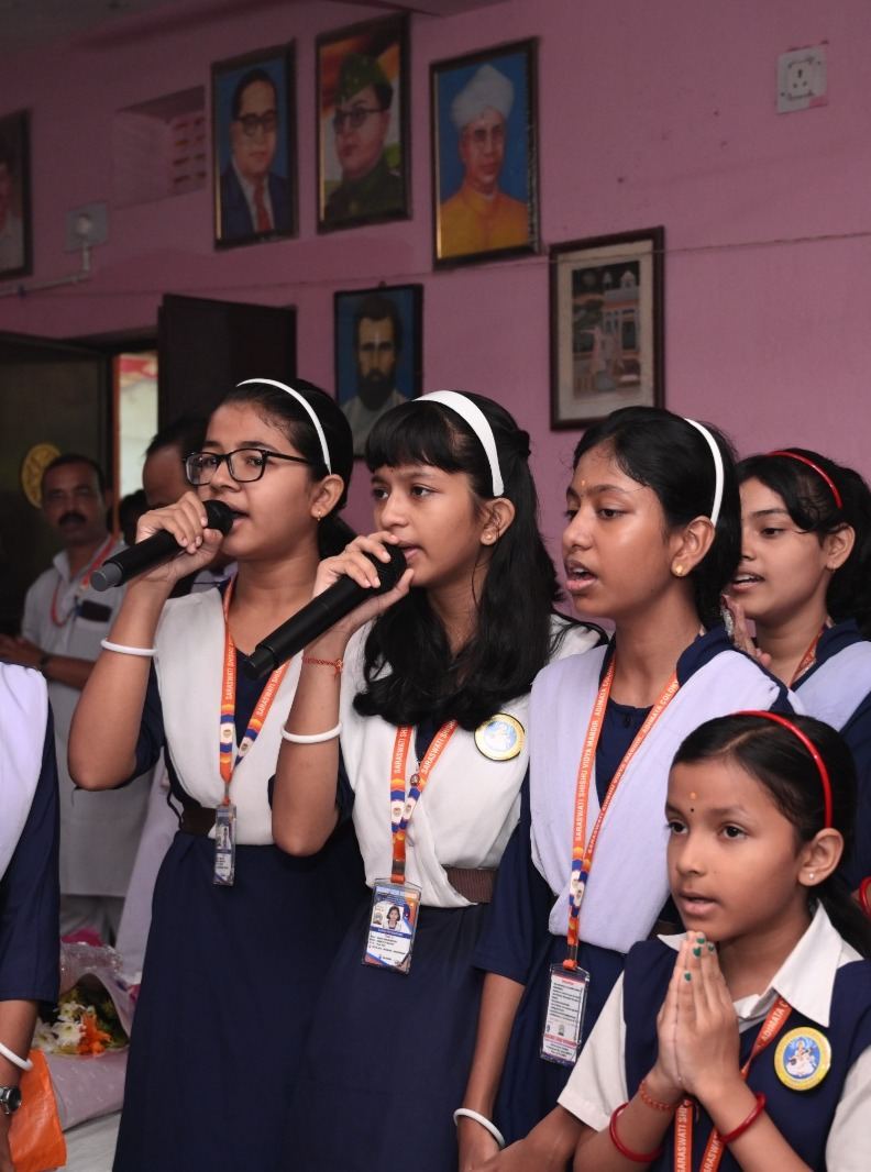 Students sing a welcome song