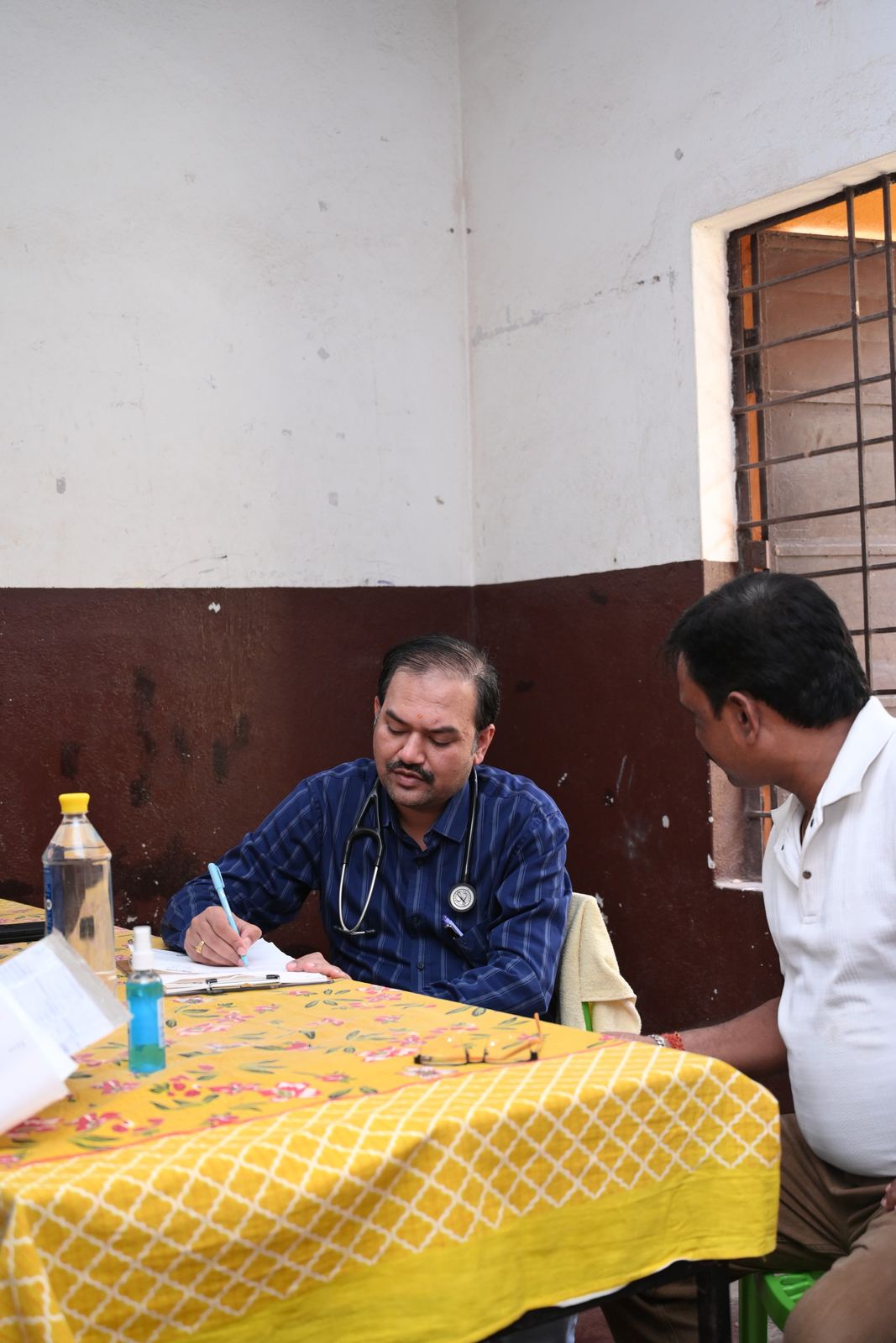 Dr. Priyabrata Sahu with a patient