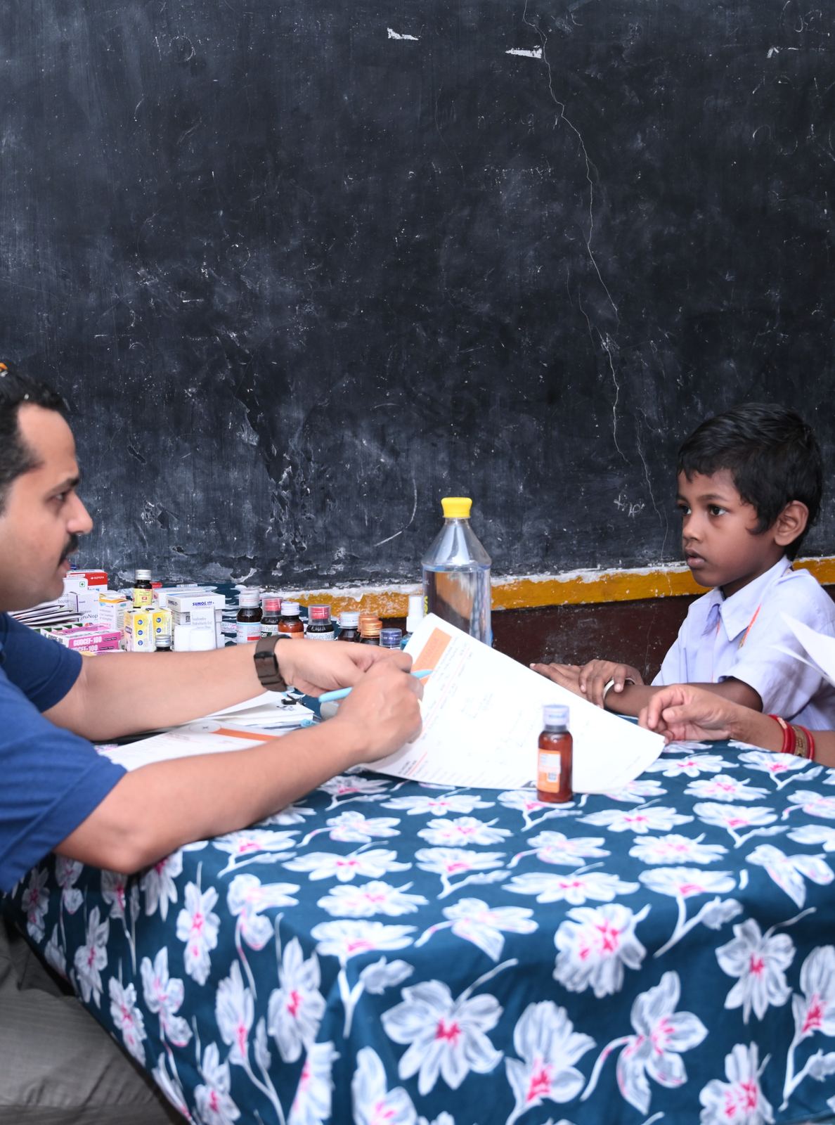 Dr. Kanhu Panda with a young patient